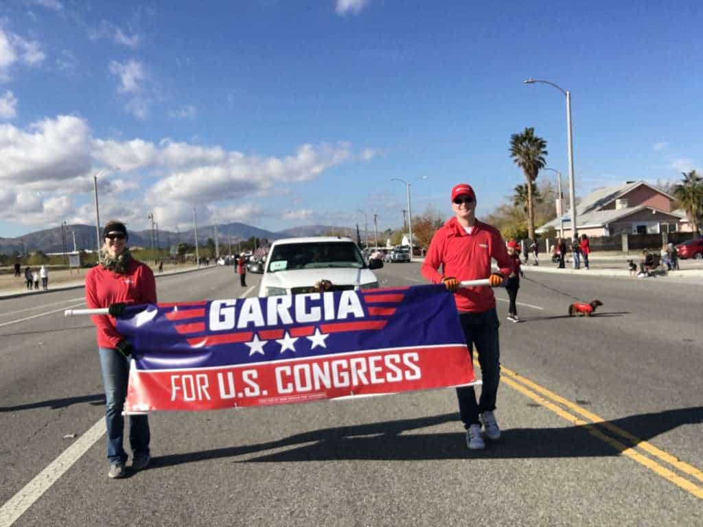 Mike Garcia volunteers holding Garcia for Congress sign.